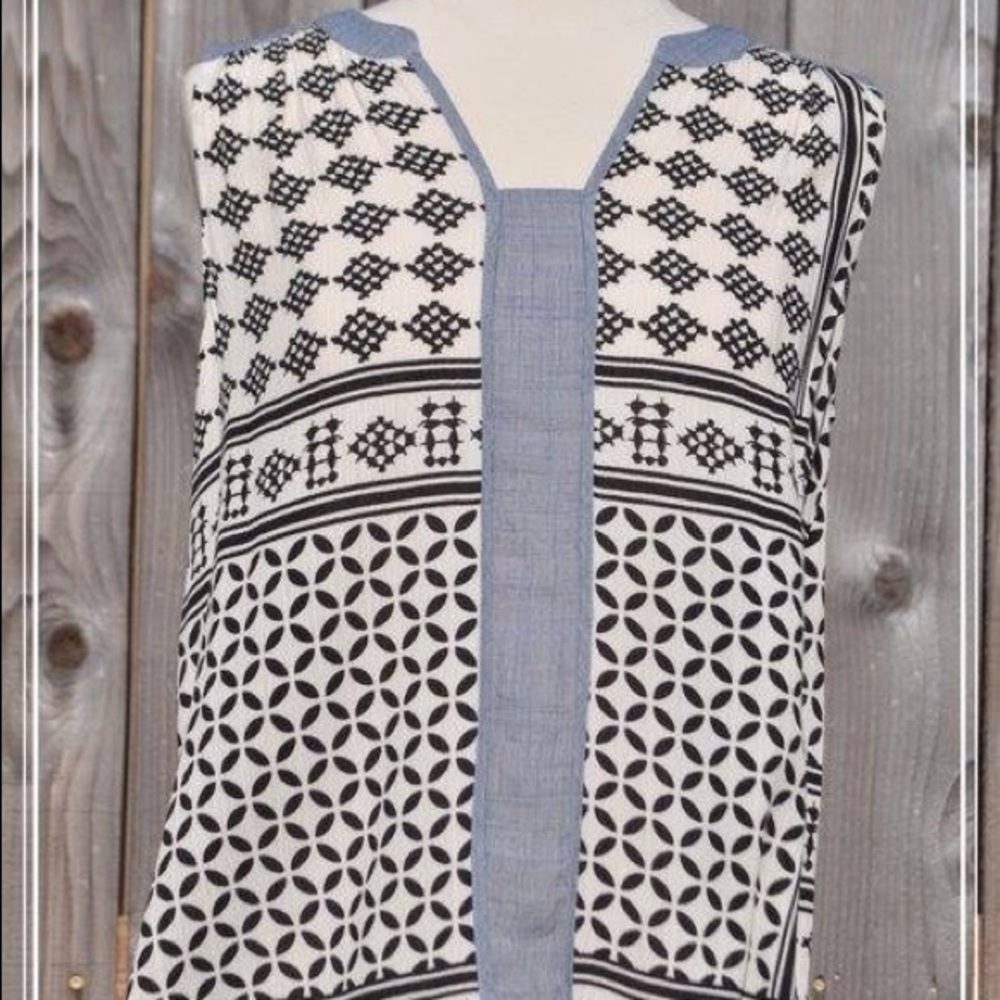 THML top. Black & white with blue accents